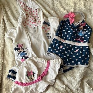 Disney Minnie Mouse Swim set. Bathing suit size 9-12M. Bath rob size 12-18M.